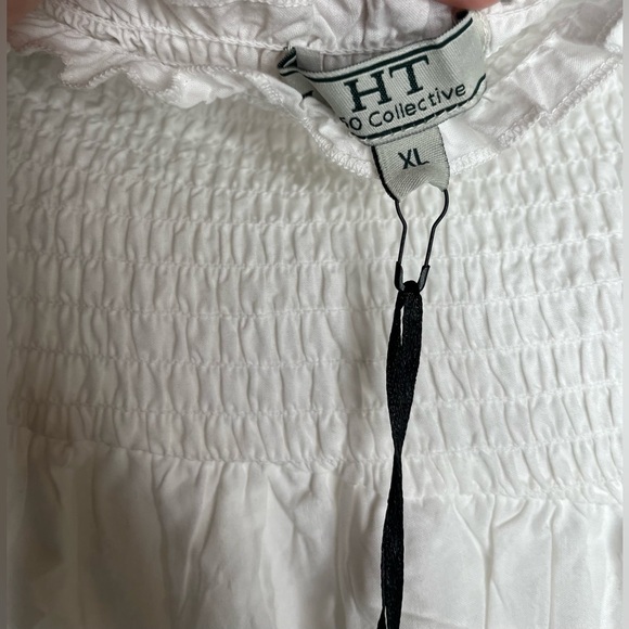 Ruffled short white mini skirt XL NWT
HT 360 Collective 100% cotton - Picture 3 of 9